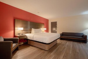 Room, 1 King Bed, Non Smoking | Premium bedding, in-room safe, desk, iron/ironing board