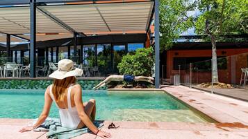 Outdoor pool, open 10:00 AM to 8:00 PM, pool loungers