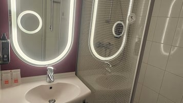 Eco-friendly toiletries, hair dryer, towels