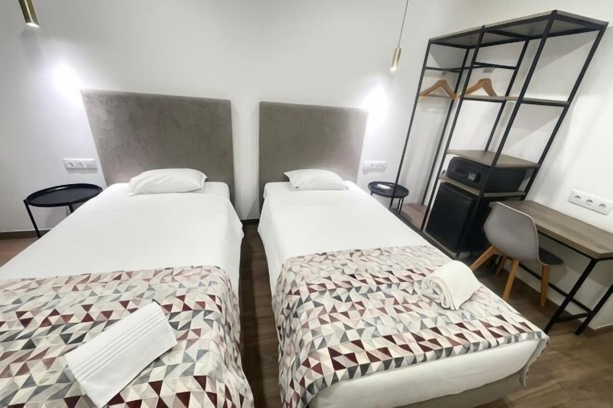 Minibar, desk, iron/ironing board (on request), cribs (free)