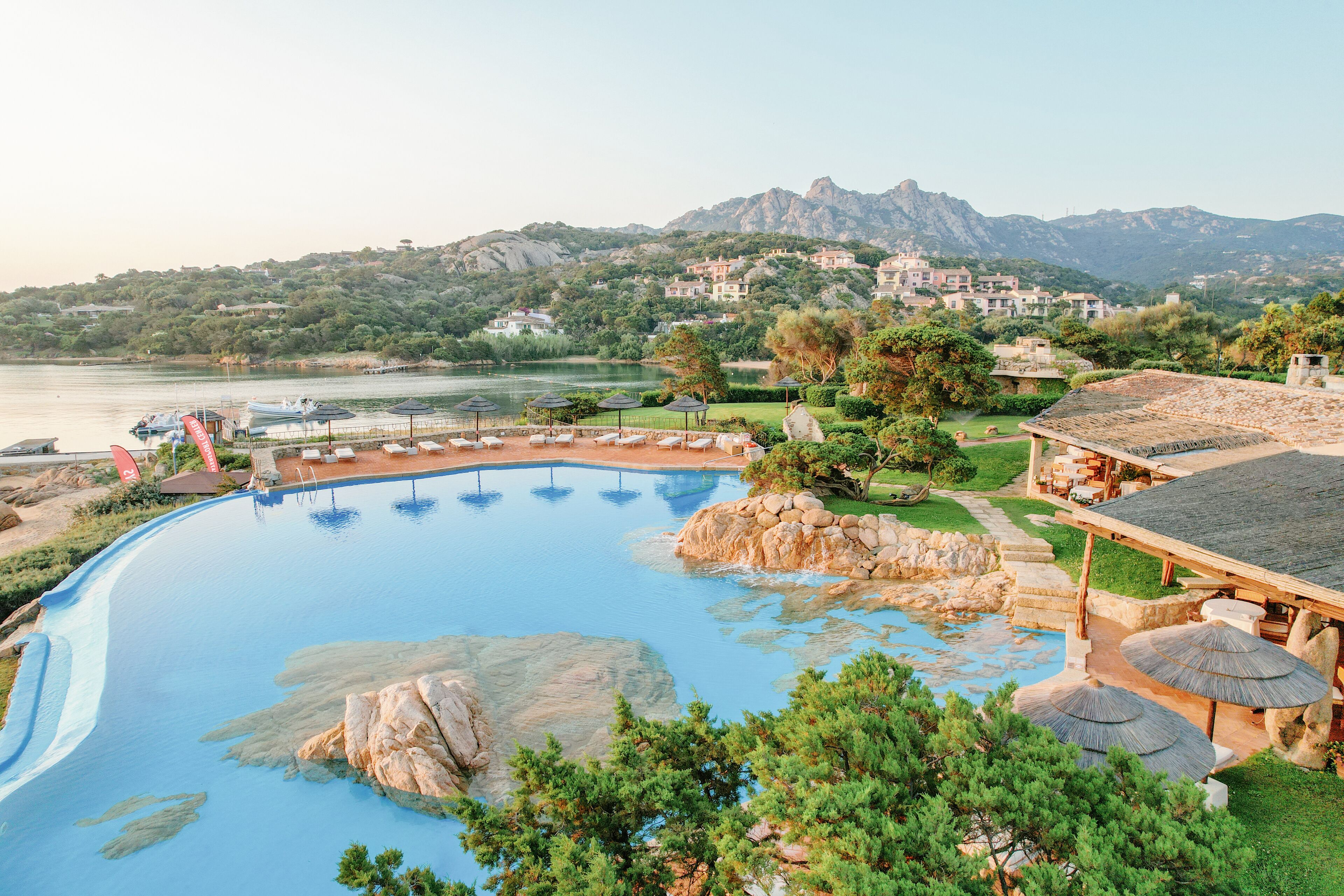 outdoor pool, pool umbrellas, pool loungers