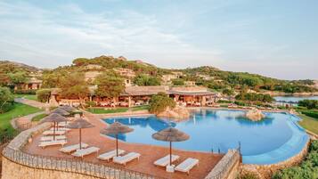 Seasonal outdoor pool, pool umbrellas, sun loungers