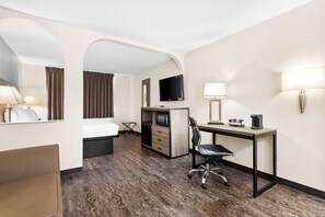 Room, 1 King Bed (Larger Room;with Sofabed) | Individually furnished, desk, laptop workspace, iron/ironing board