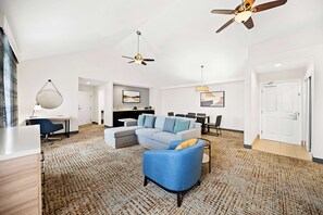 Suite, 1 King Bed, Non Smoking | Living area | 55-inch LCD TV with cable channels, TV, Netflix