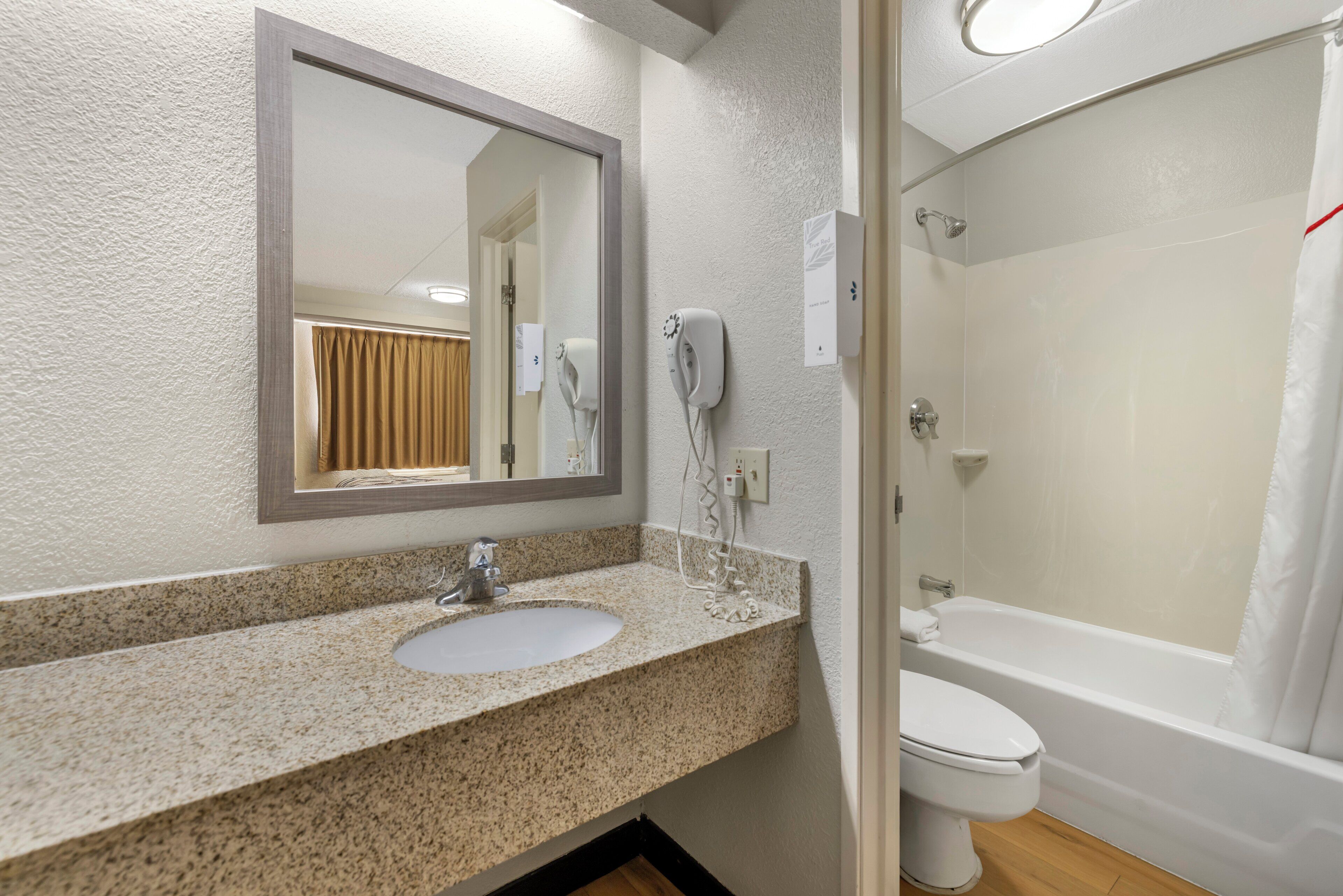 Eco-friendly toiletries, hair dryer, towels, soap