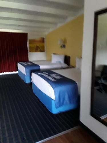 Down comforters, pillowtop beds, desk, blackout drapes