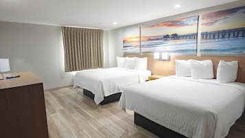 Down duvets, pillow-top beds, desk, blackout curtains