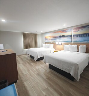 Down comforters, pillowtop beds, desk, blackout drapes