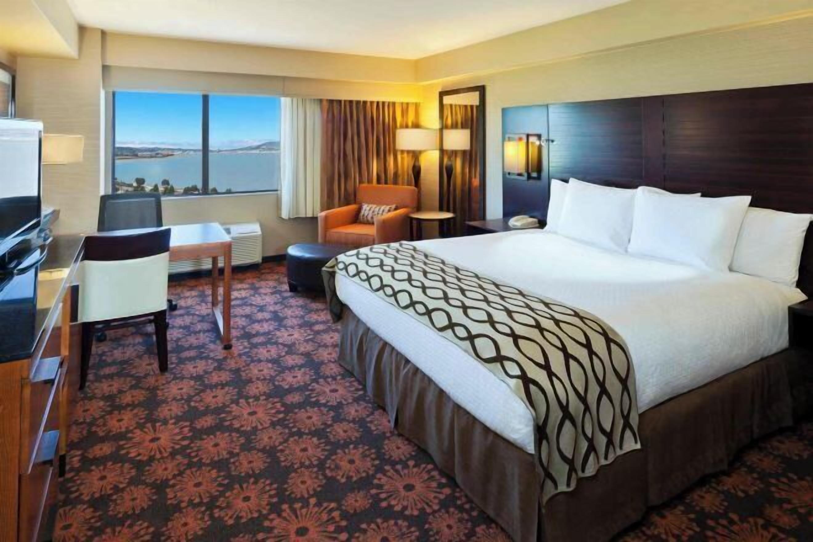 In-room safe, desk, laptop workspace, blackout curtains