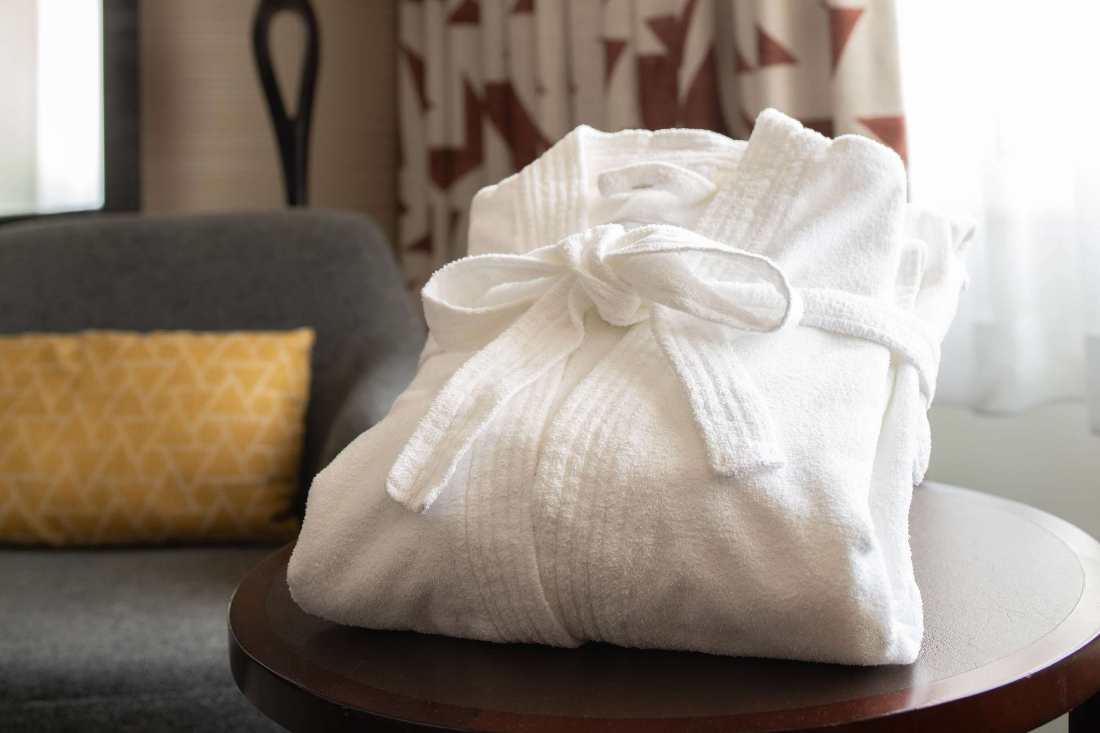 eco-friendly toiletries, hair dryer, towels