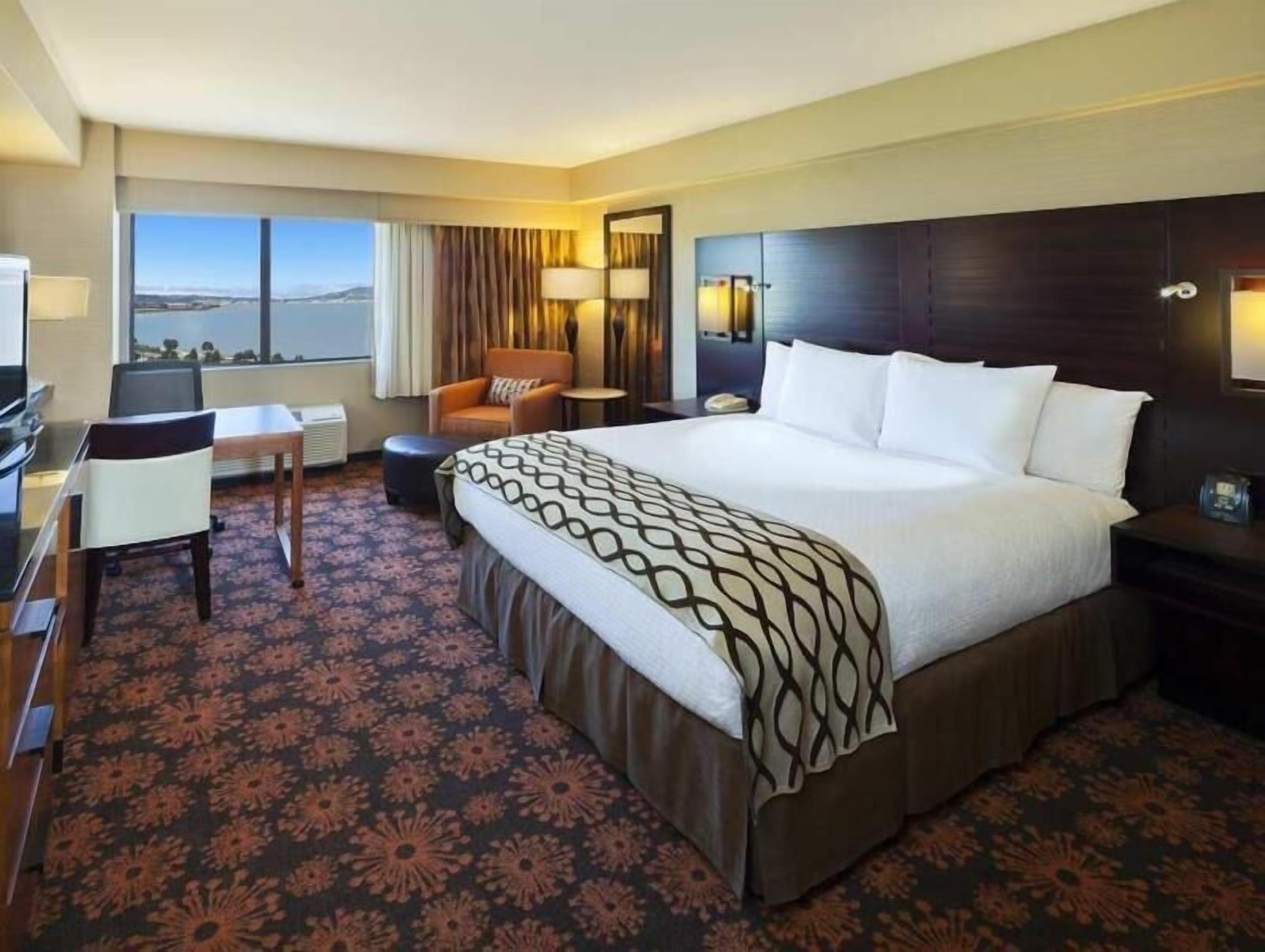 In-room safe, desk, laptop workspace, blackout curtains