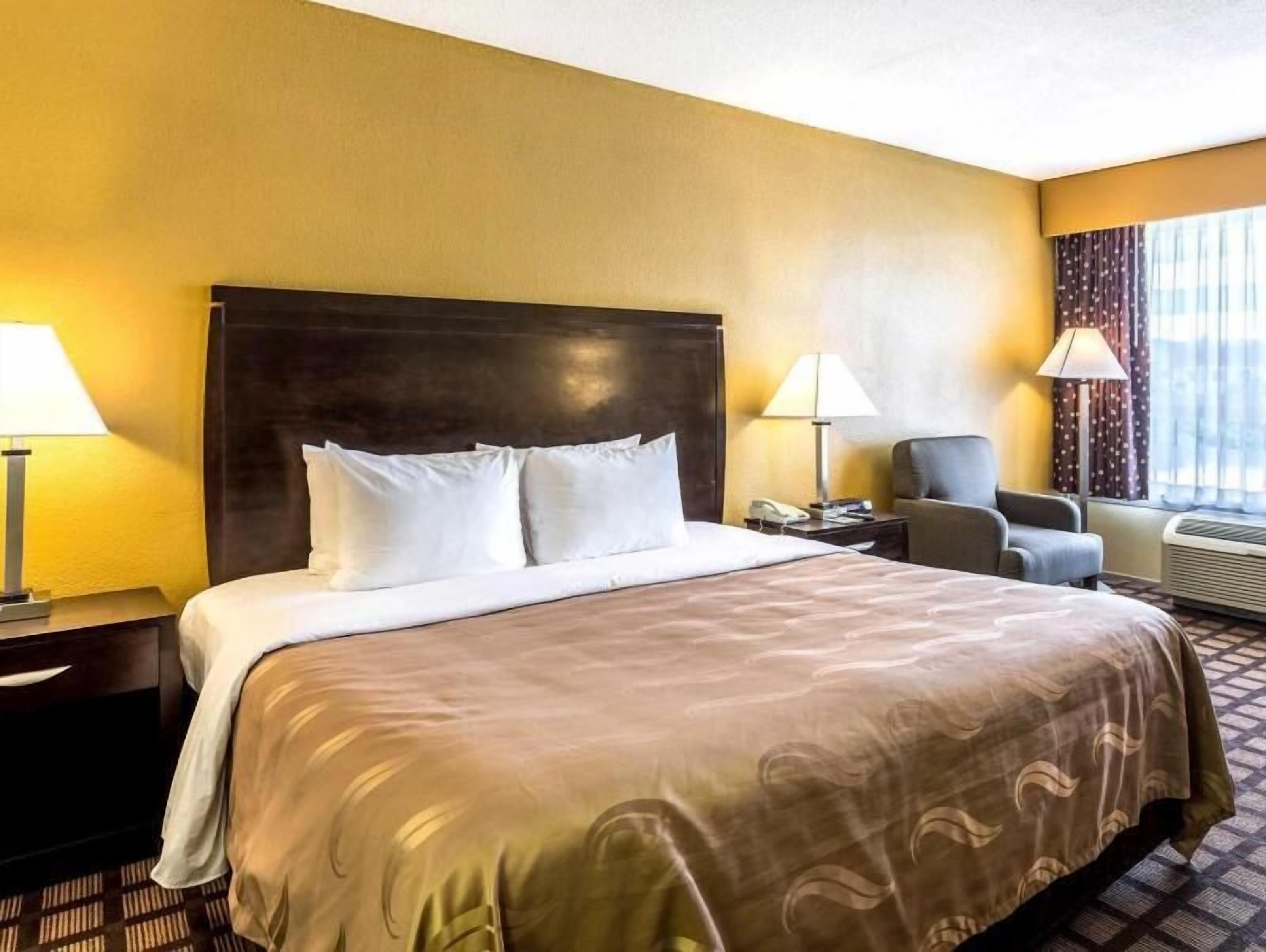 Down duvets, pillow-top beds, desk, laptop workspace