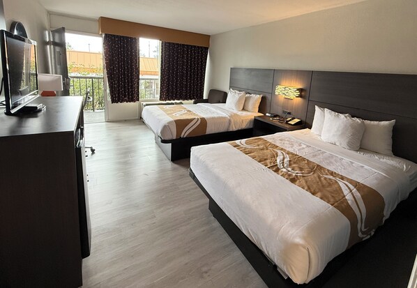 Down duvets, pillow-top beds, desk, laptop workspace