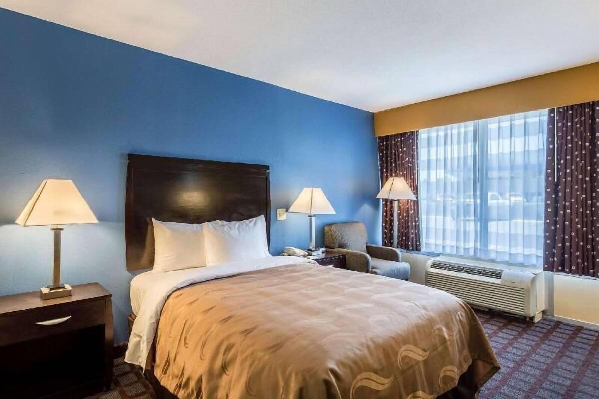 Down duvets, pillow-top beds, desk, laptop workspace