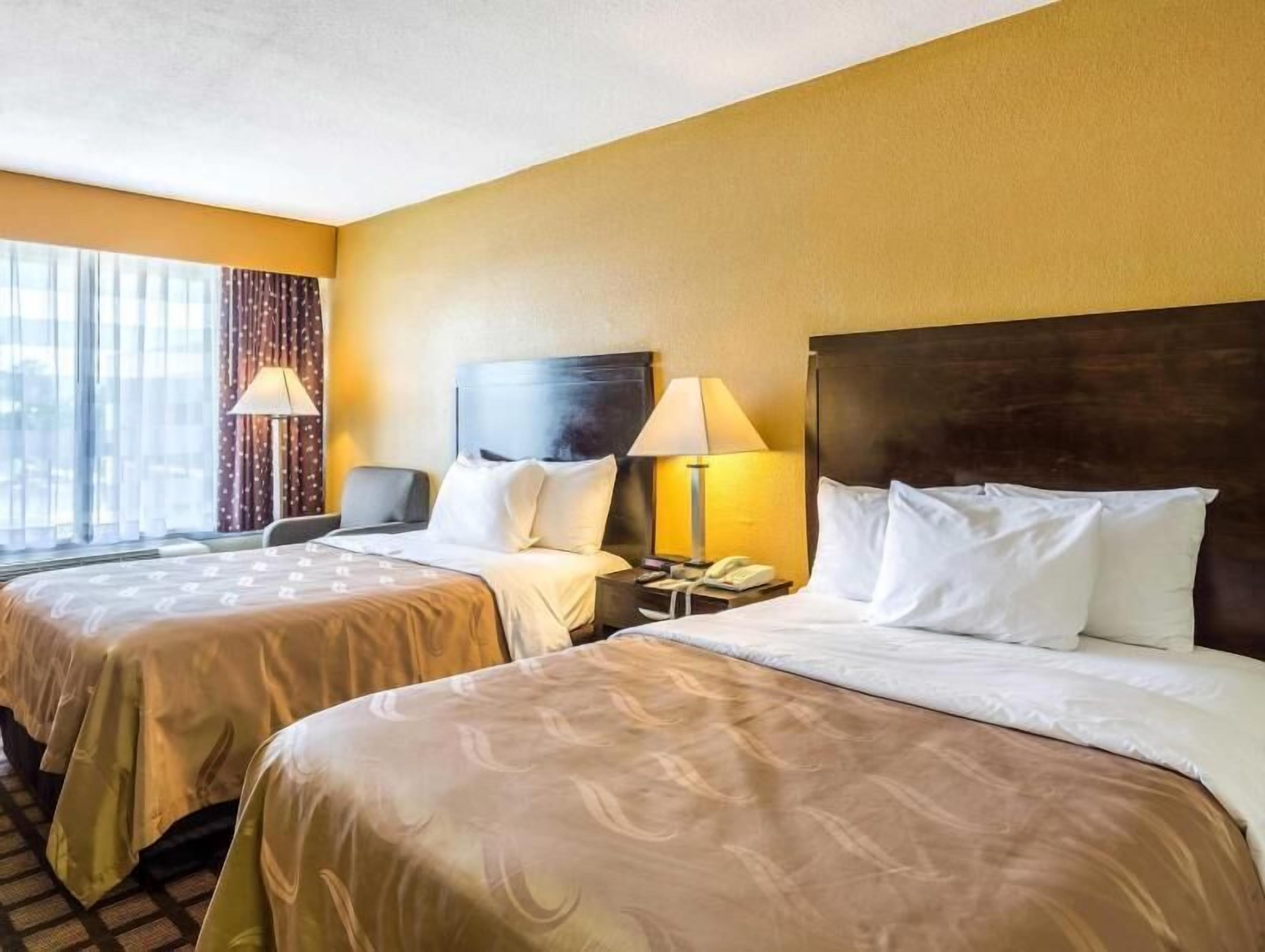 Down duvets, pillow-top beds, desk, laptop workspace