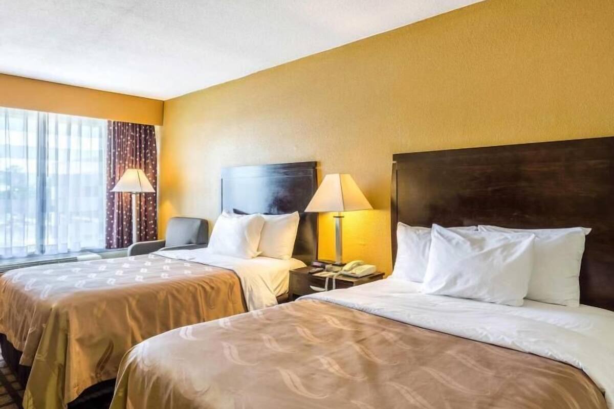 Down duvets, pillow-top beds, desk, laptop workspace