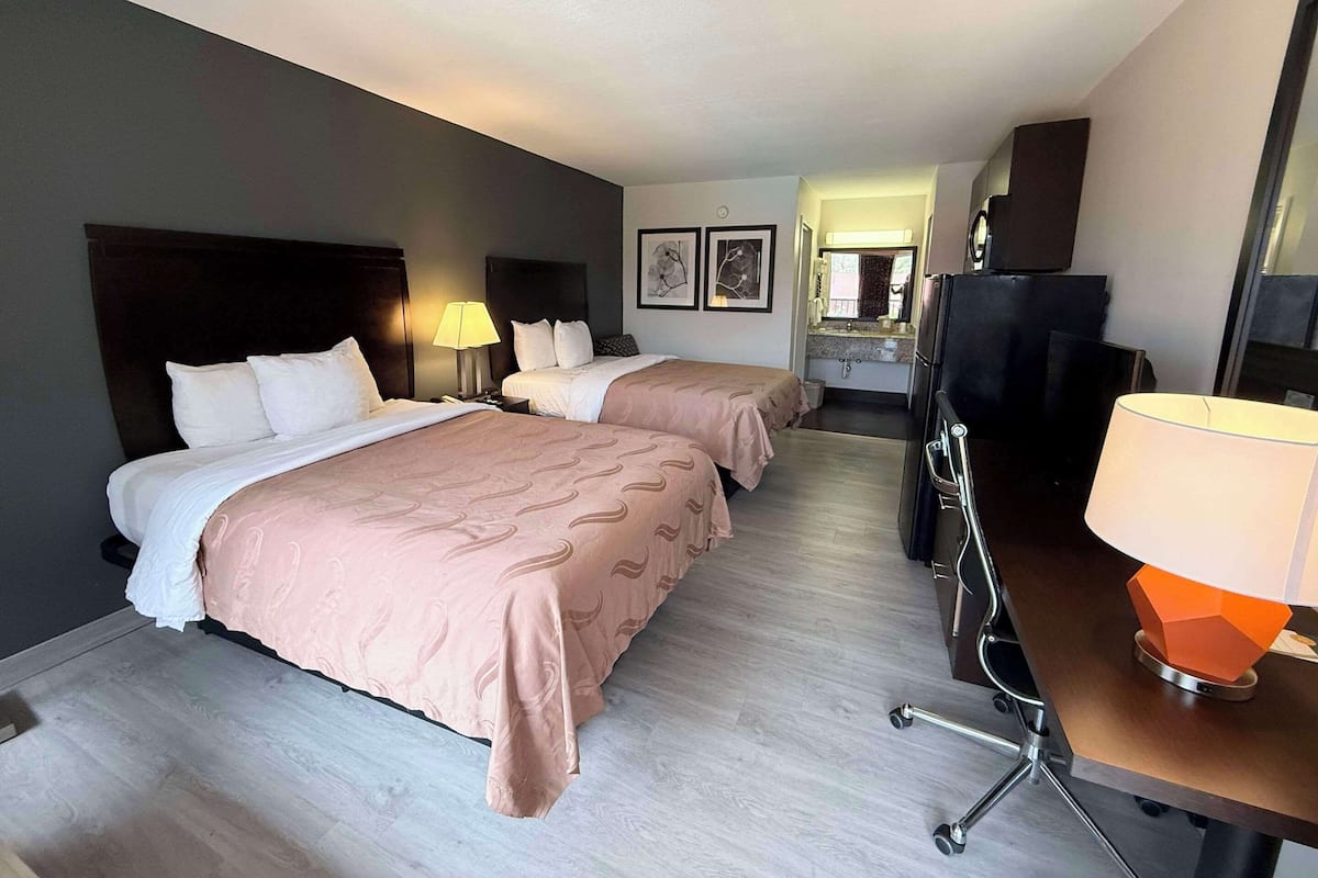Down comforters, pillowtop beds, desk, laptop workspace