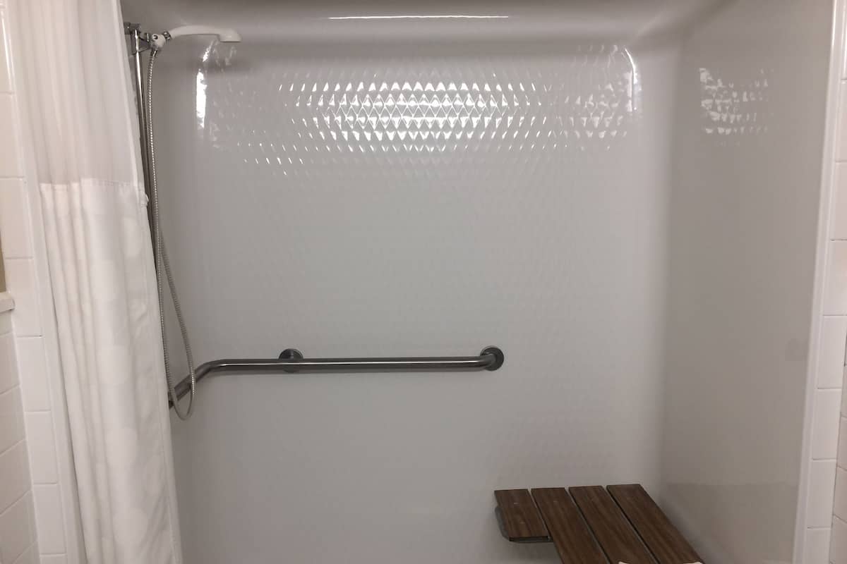 Non Smoking Two Queens Handicap | Bathroom | Free toiletries, hair dryer, towels