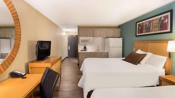 Premium bedding, down comforters, desk, laptop workspace