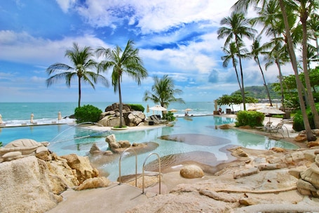 2 outdoor pools, open 7:00 AM to 7:00 PM, pool umbrellas, sun loungers