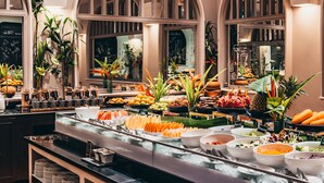 A buffet with various fruits, vegetables, and dishes. - Sheraton Samui Resort (Koh Samui)
