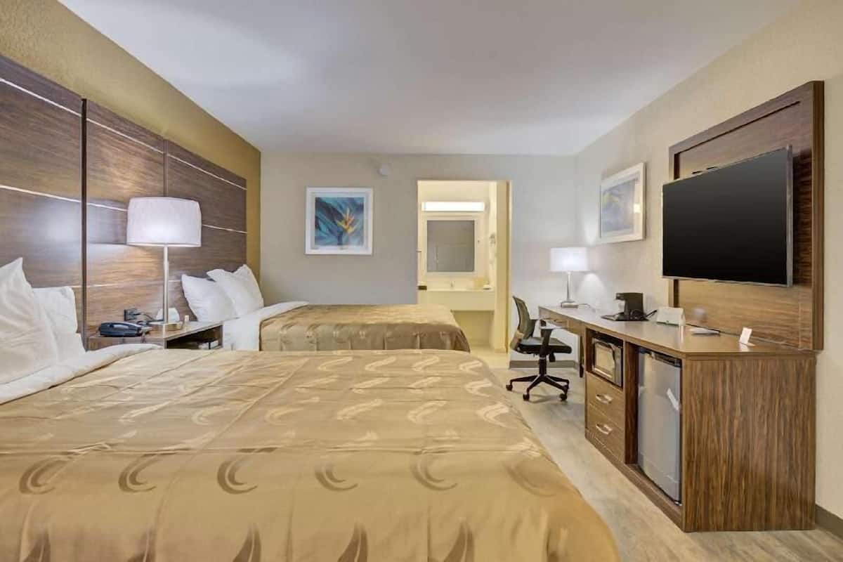 Down comforters, desk, laptop workspace, blackout drapes