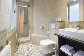 Eco-friendly toiletries, hair dryer, bathrobes, towels