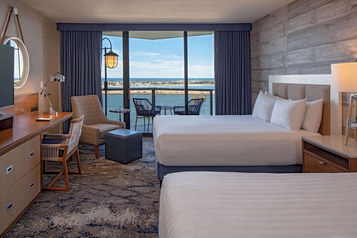 Down comforters, pillowtop beds, in-room safe, desk