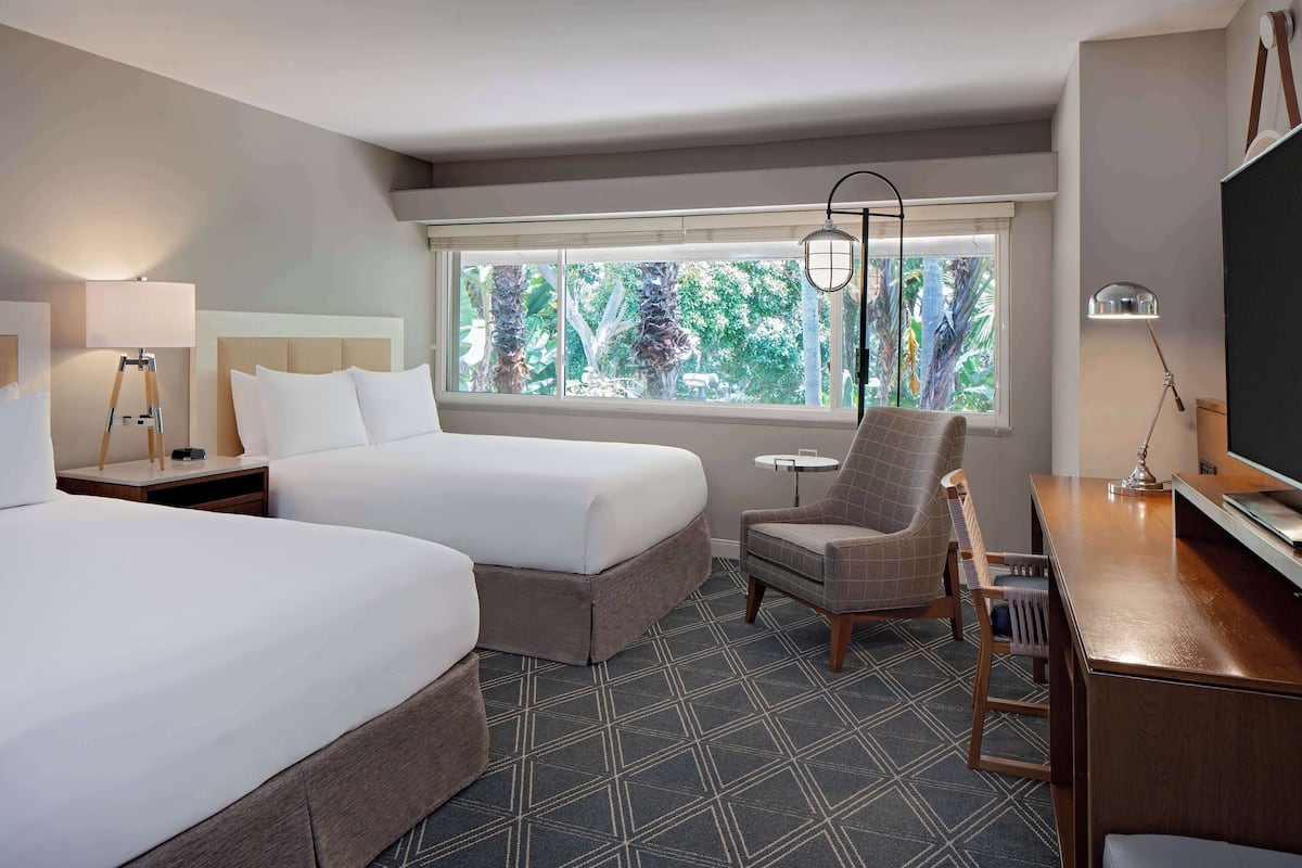 Down comforters, pillowtop beds, in-room safe, desk