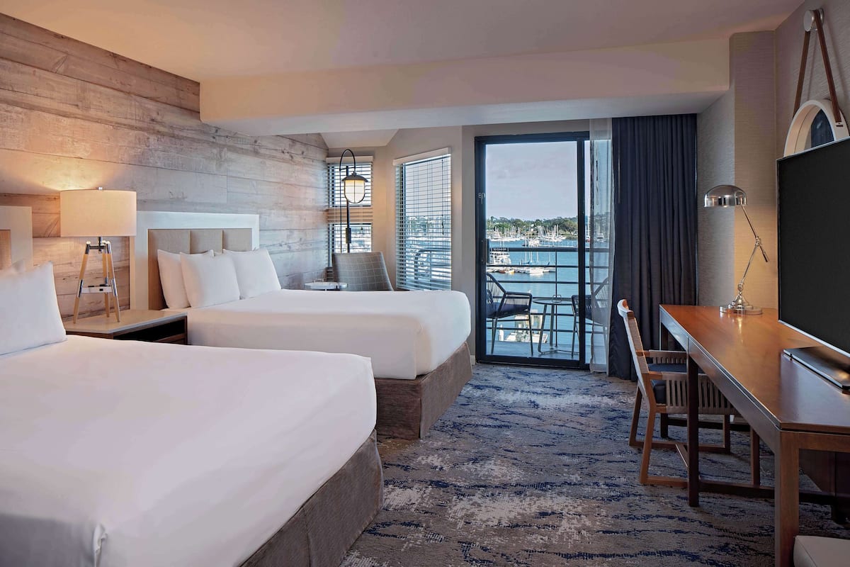 Down comforters, pillowtop beds, in-room safe, desk