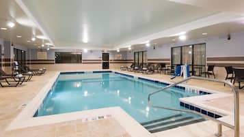 Indoor pool, open 7:00 AM to 10:00 PM, pool loungers