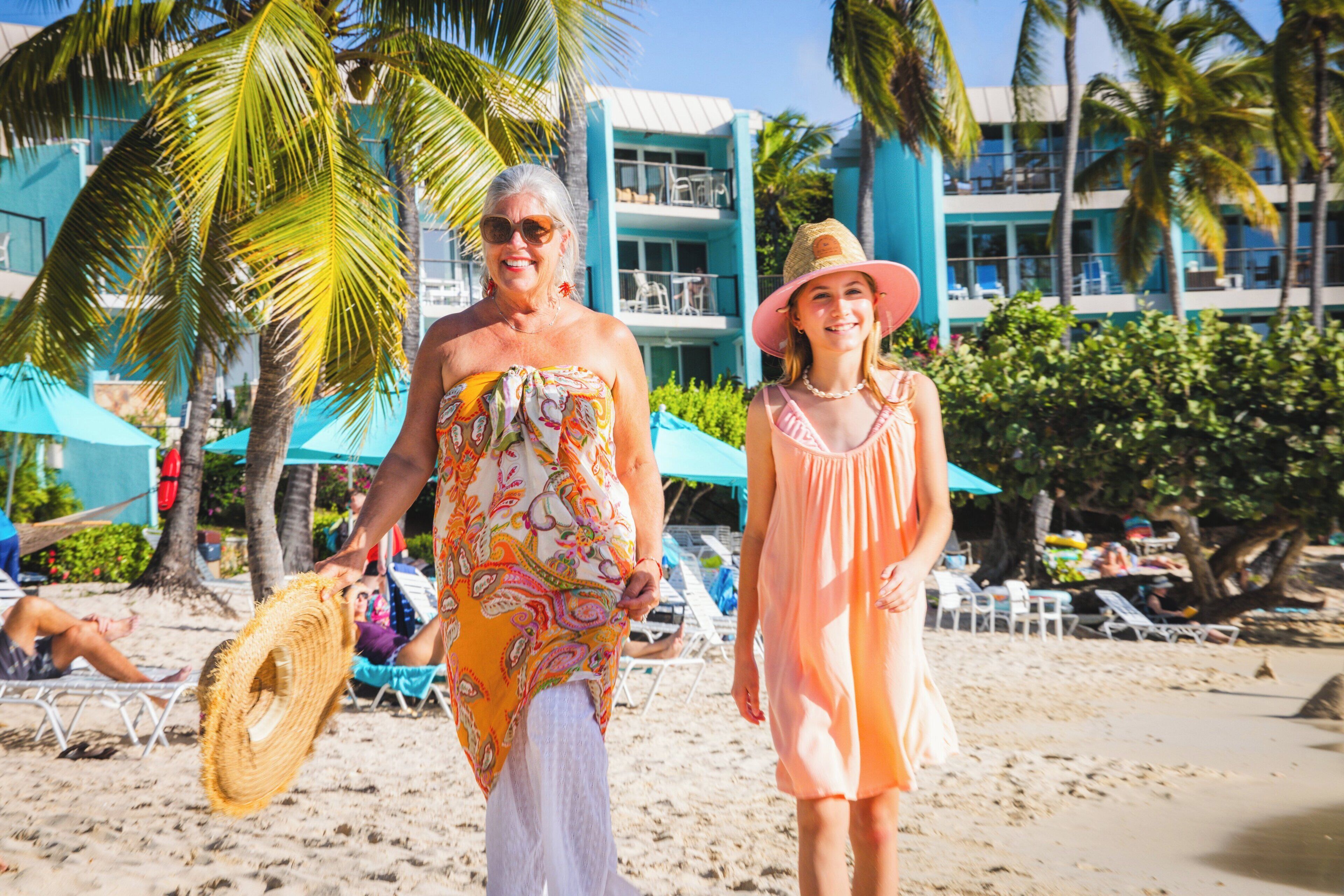 On the beach, white sand, sun-loungers, beach umbrellas