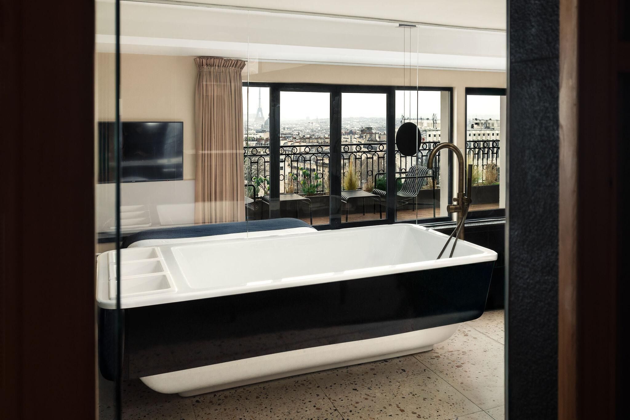 penthouse panoramic view | bathroom | eco-friendly toiletries, hair dryer, towels, soap