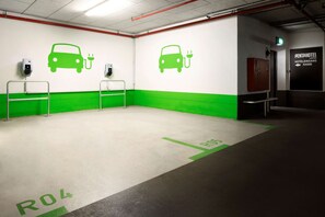 Park and charge your electric vehicle at our designated stations, conveniently marked with clear signage.
