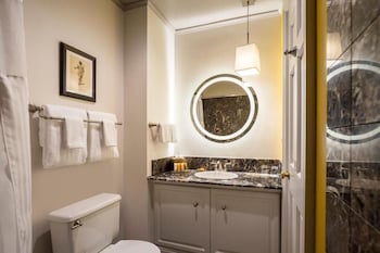 Combined shower/tub, designer toiletries, hair dryer, bathrobes at Warwick San Francisco