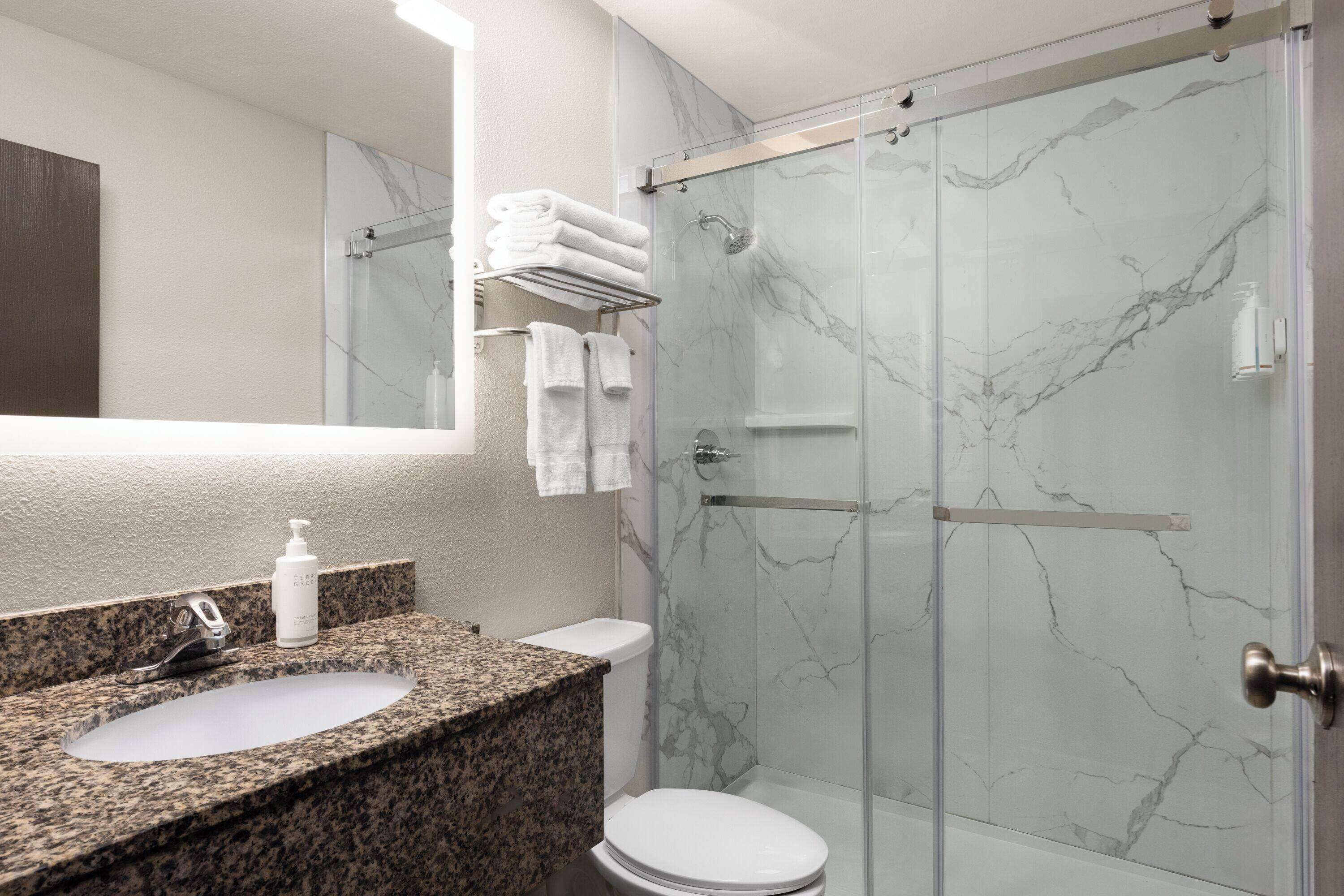 Combined shower/tub, eco-friendly toiletries, hair dryer, towels