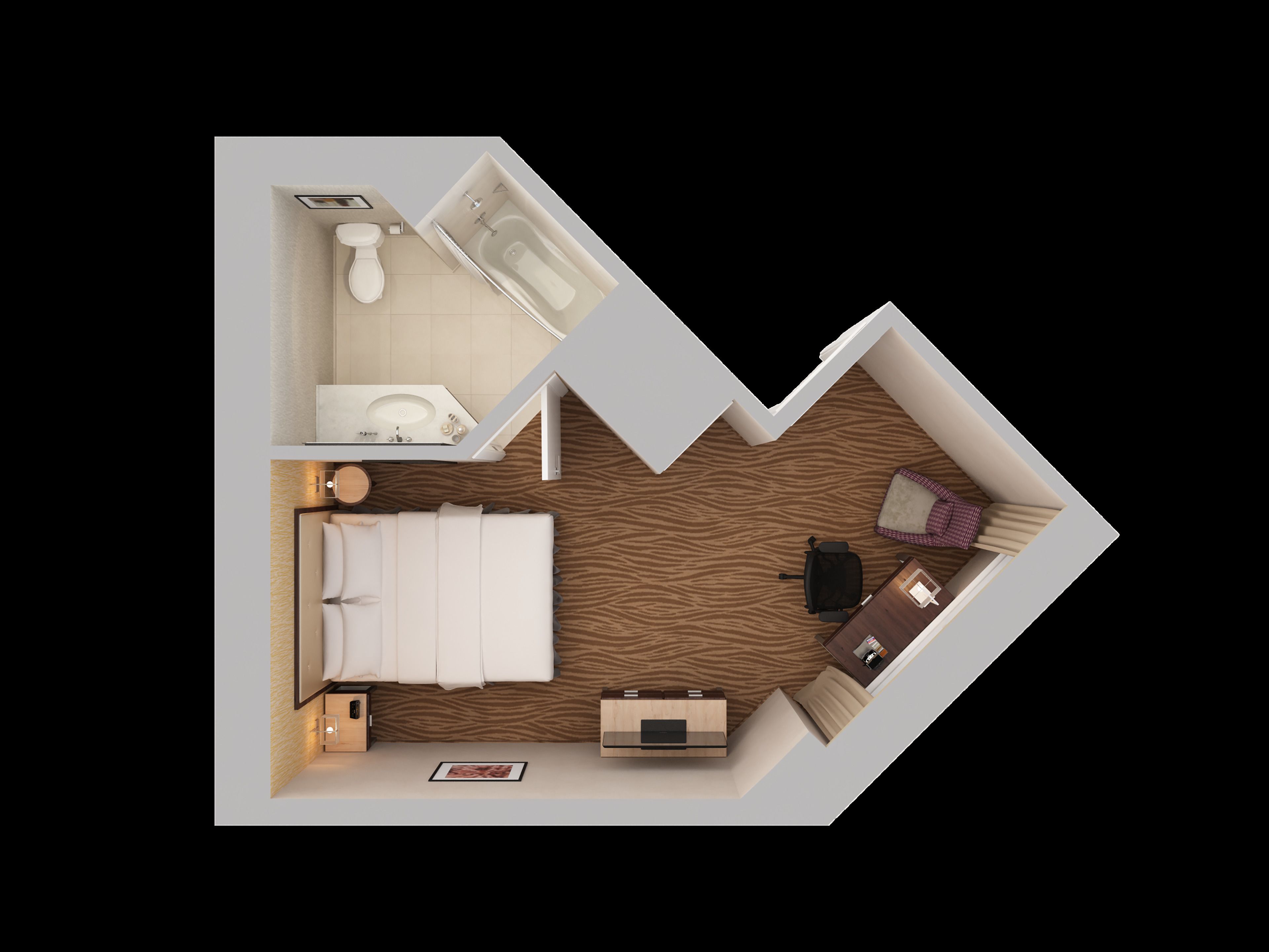 Habitación de hotel con cama, escritorio, silla, una mesita, un sofá y baño con bañera e inodoro.