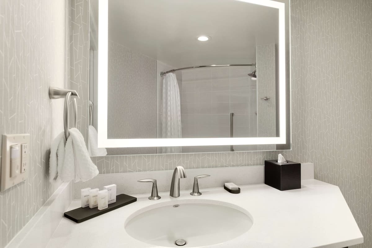 studio, 1 queen bed (one room only) | bathroom | eco-friendly toiletries, hair dryer, towels, soap