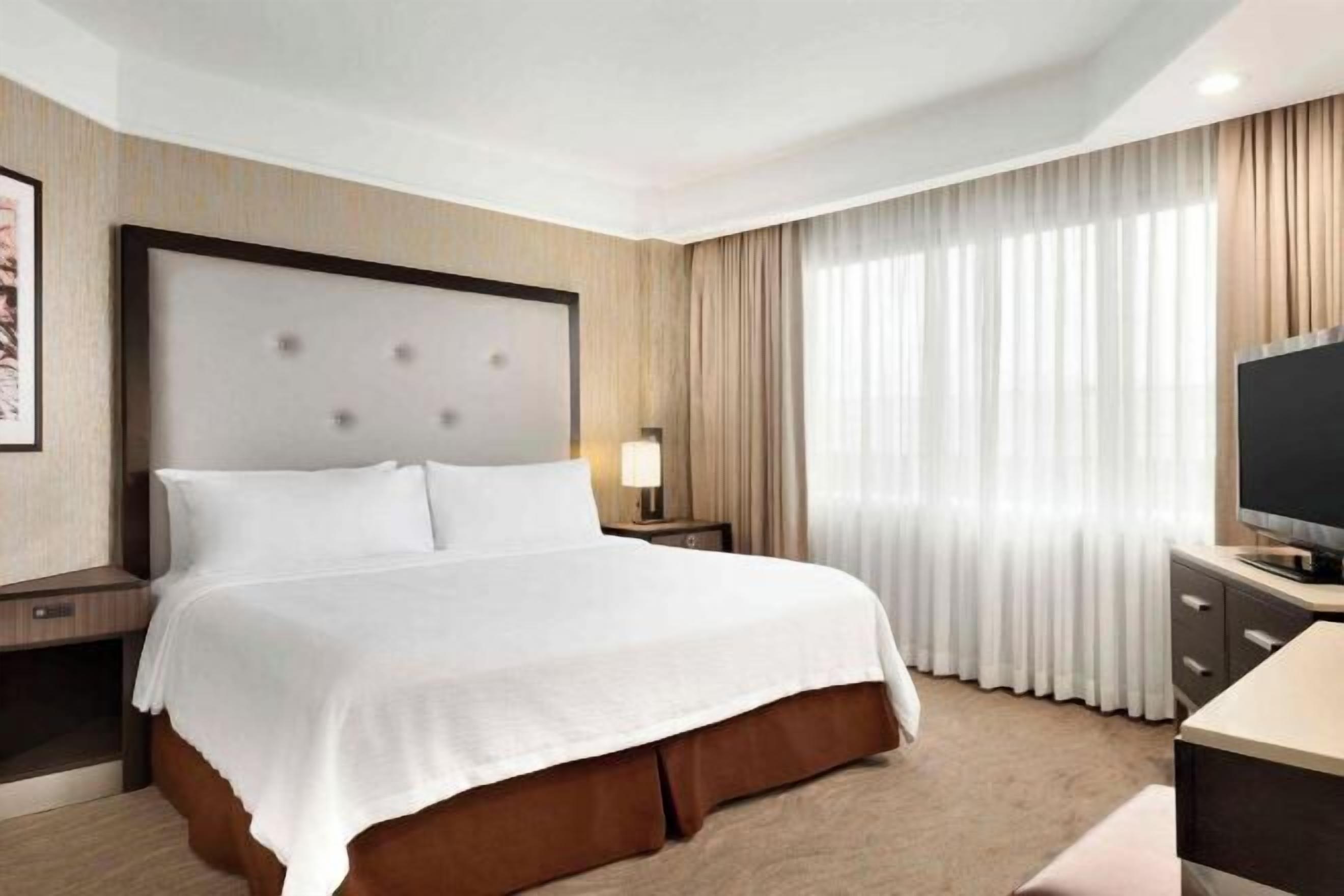 Premium bedding, in-room safe, desk, soundproofing