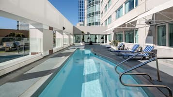 Outdoor pool, open 10:00 AM to 10:00 PM, sun loungers