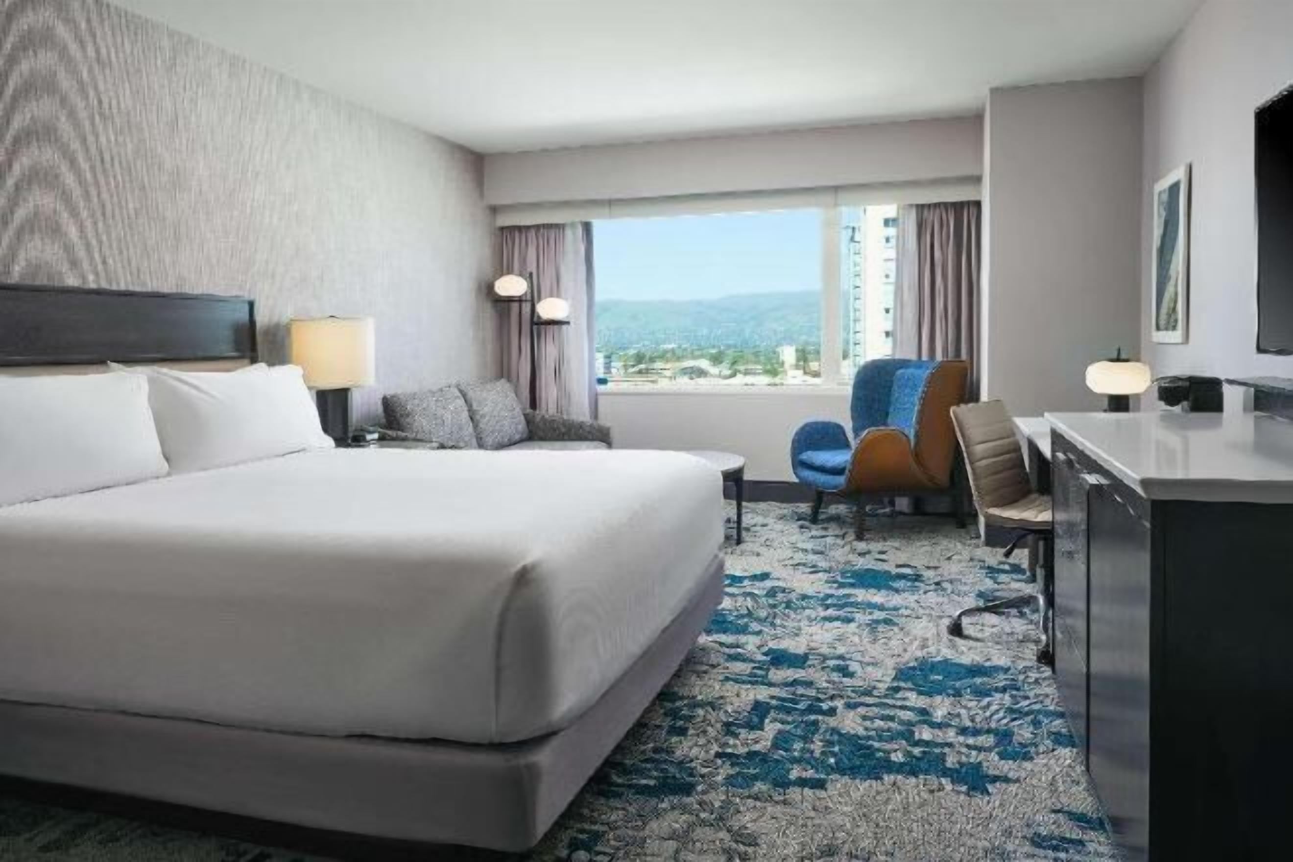 Premium bedding, pillow-top beds, in-room safe, desk