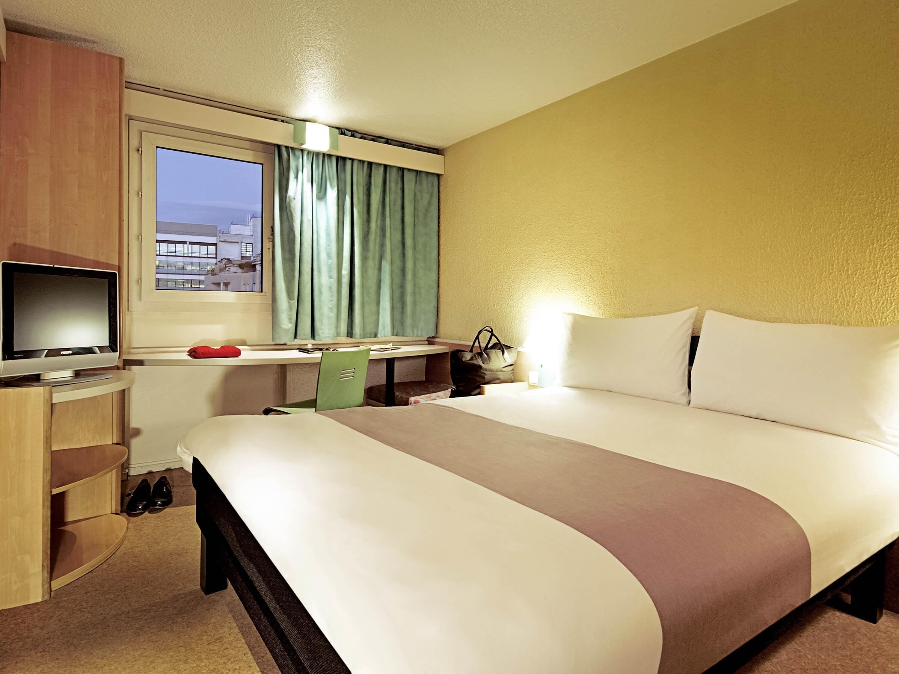 Luxe beddengoed, pillowtop-bedden, een kluis op de kamer, een bureau