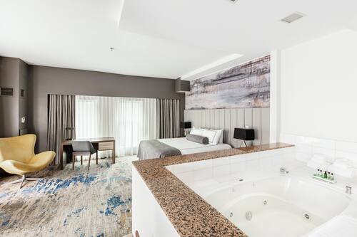 Premium Suite, 1 King Bed | 1 bedroom, in-room safe, desk, laptop workspace