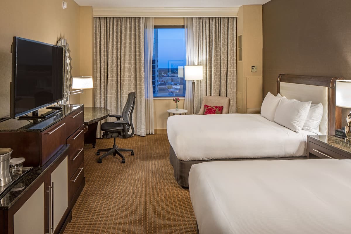 Premium bedding, down comforters, pillowtop beds, in-room safe