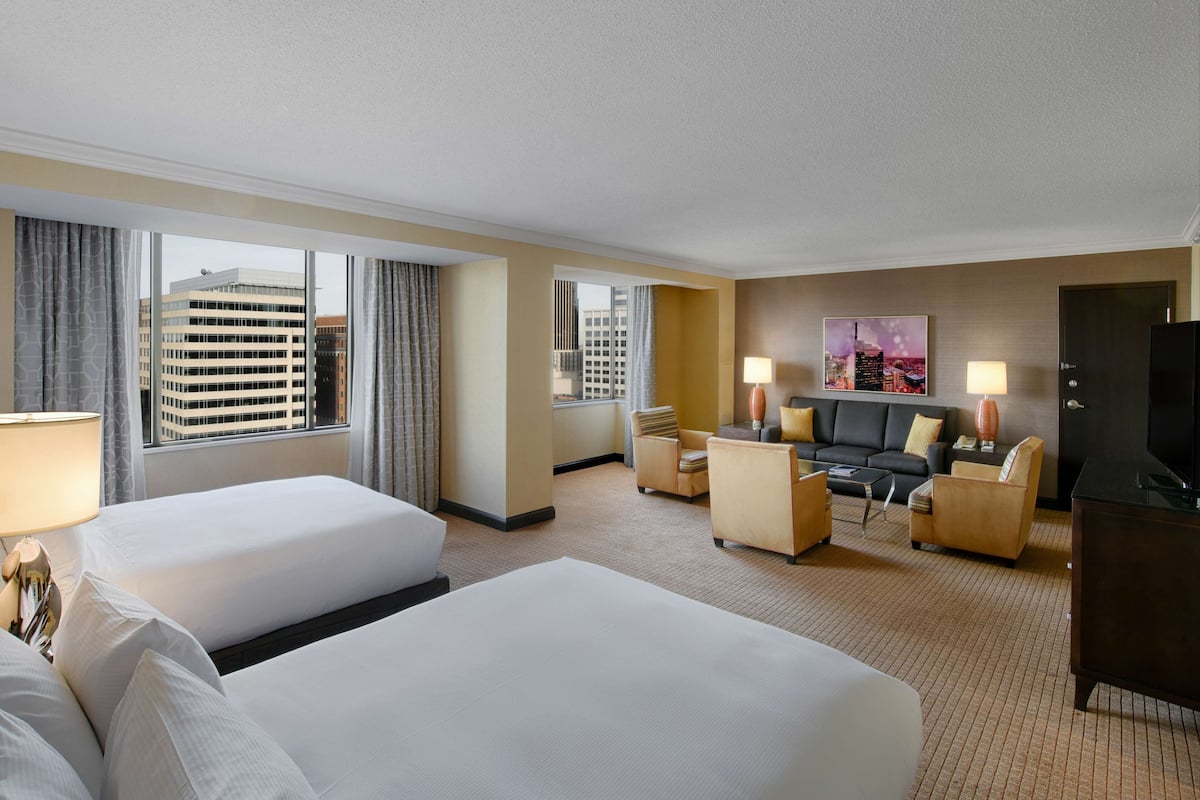 Deluxe Junior Suite, 2 Queen Beds | Living area | 50-inch LCD TV with cable channels, TV, iPod dock