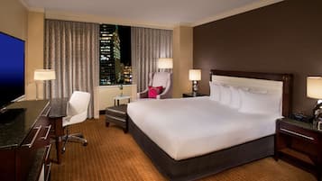 Premium bedding, down comforters, pillowtop beds, in-room safe