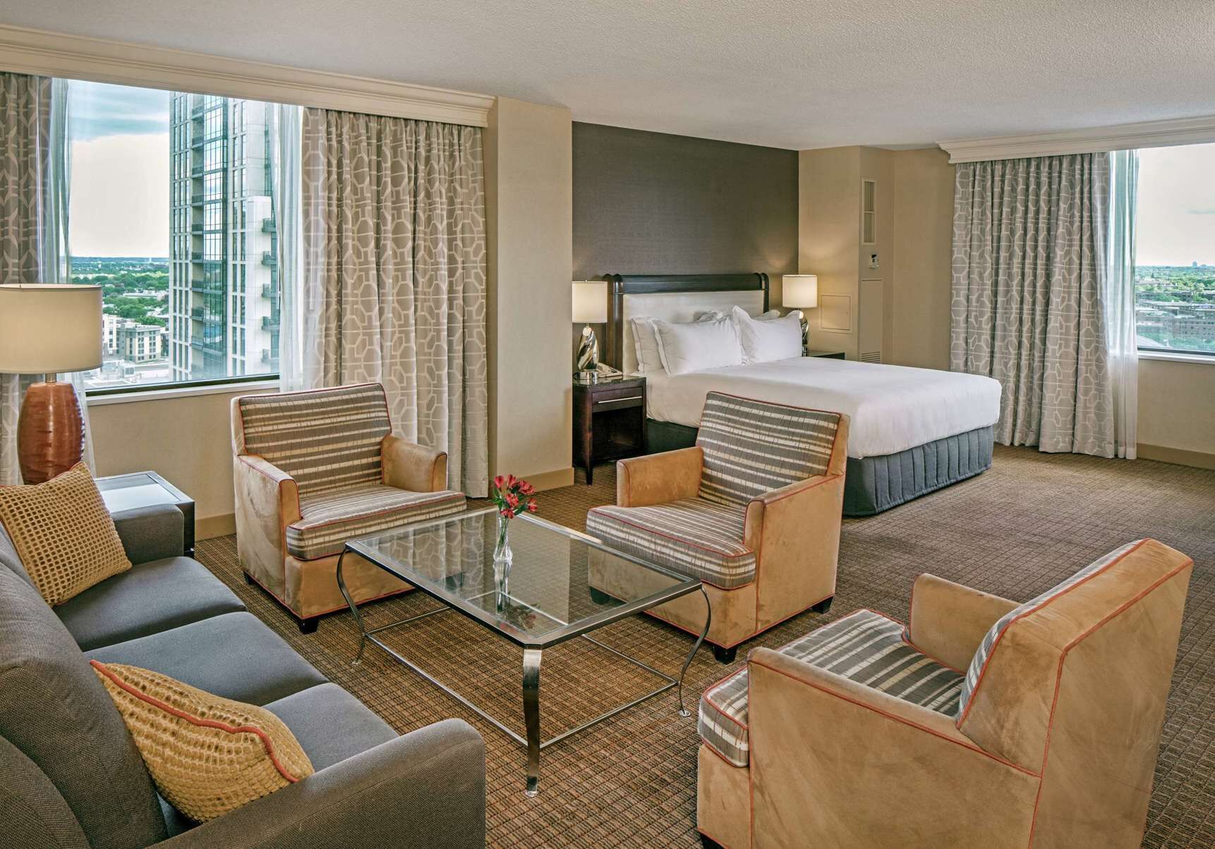 Premium bedding, down comforters, pillowtop beds, in-room safe