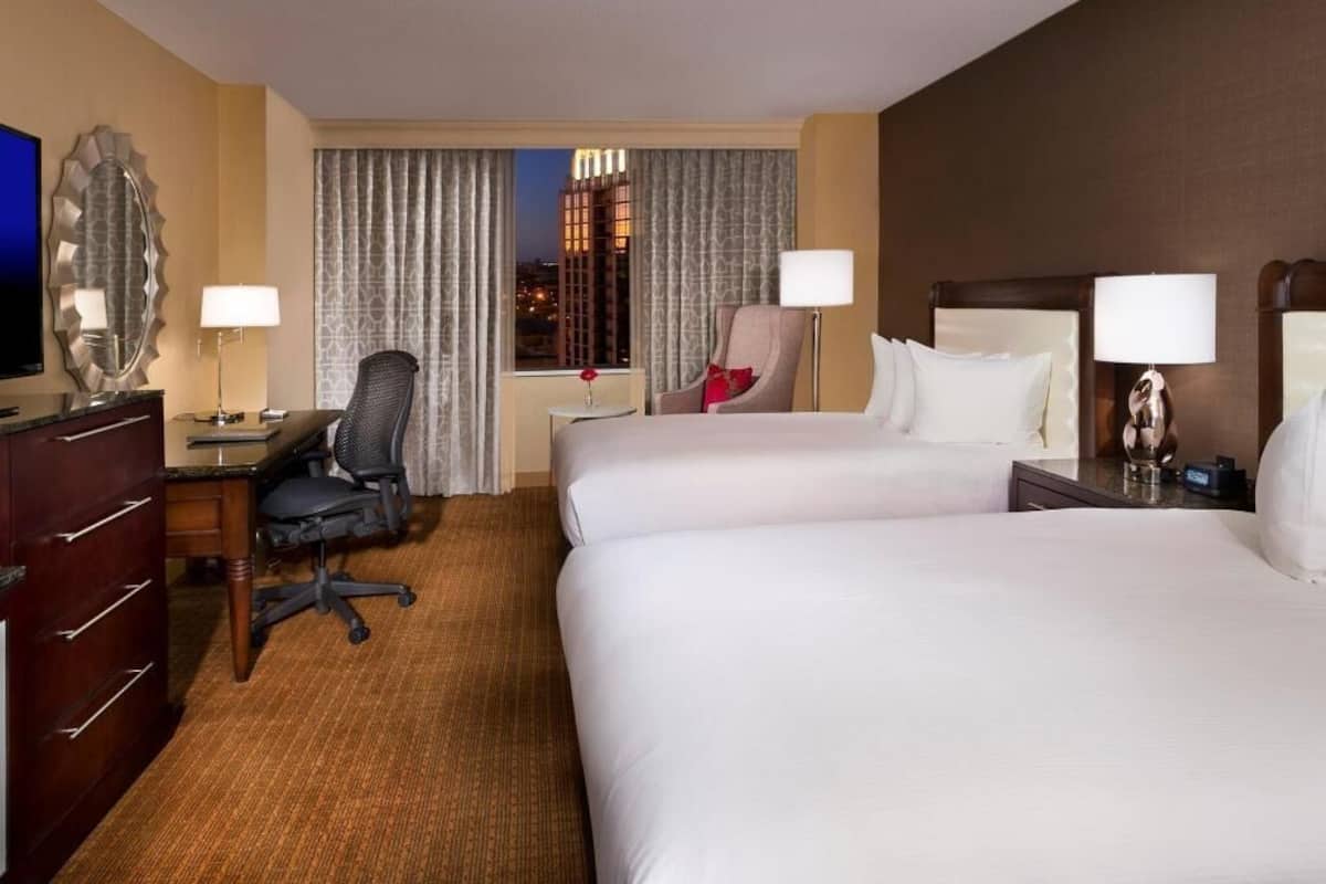 Premium bedding, down comforters, pillowtop beds, in-room safe