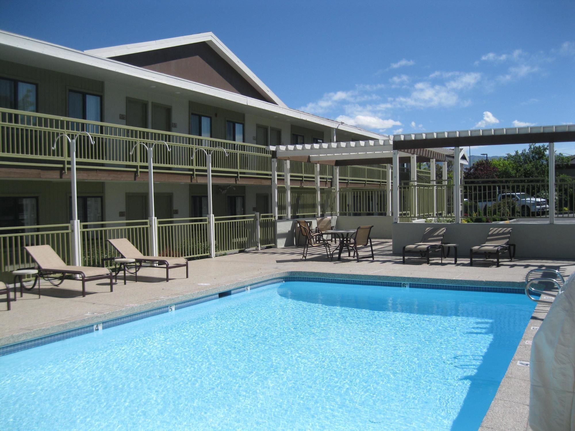 Outdoor pool, open 7:00 AM to 11:30 PM, pool umbrellas, sun loungers