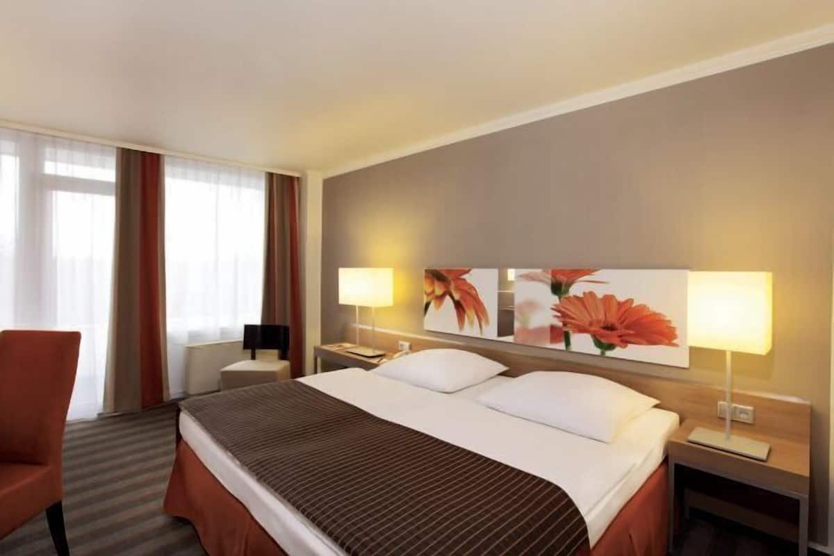 Literie de qualité supérieure, coffres-forts dans les chambres, bureau